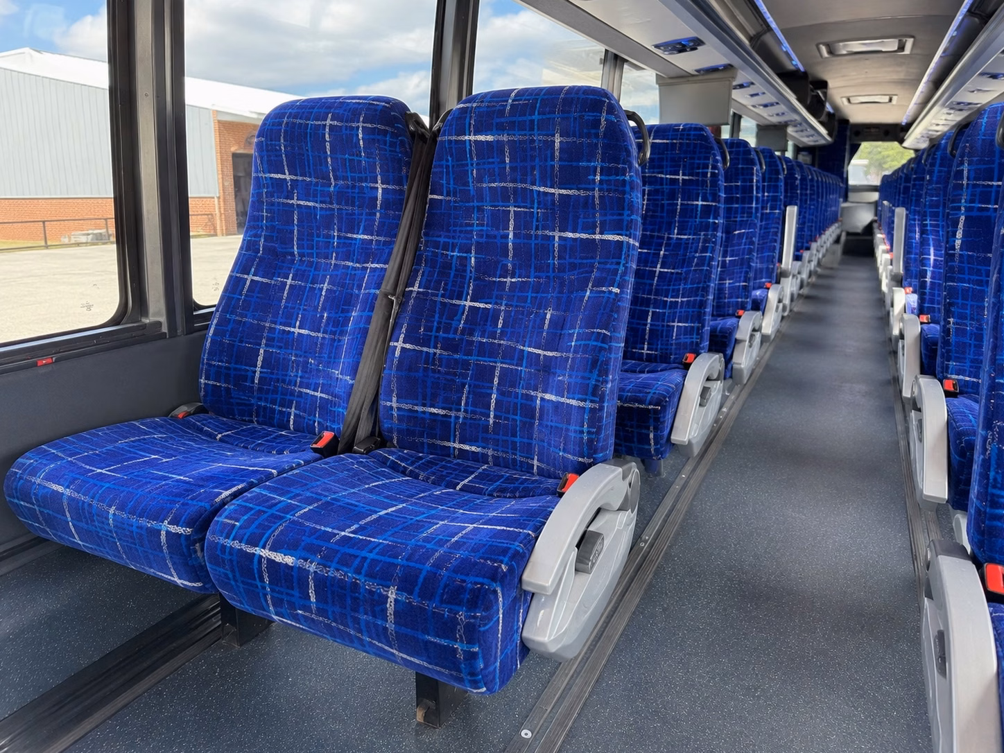 how trip distance and duration affect charter bus rates in compton